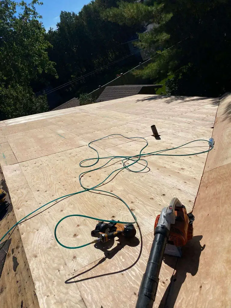 Ace Roofing team inspecting a roof in Toronto