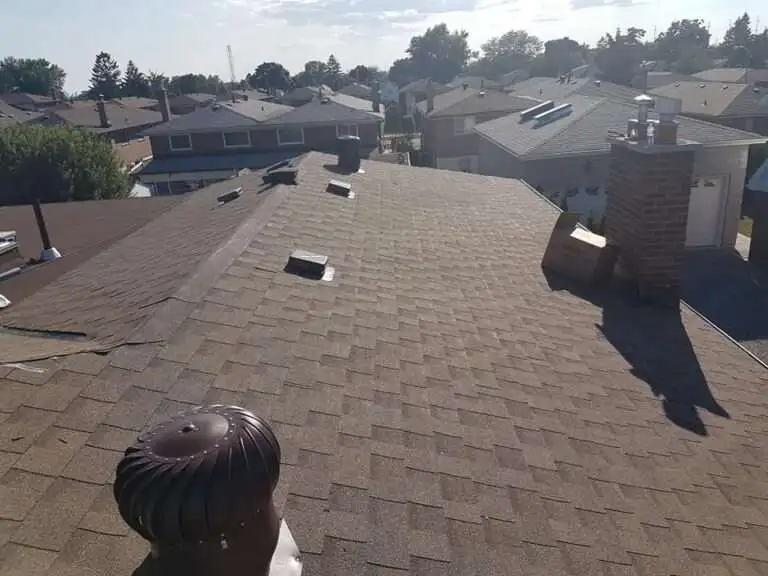 Residential rooftop with new ventilation systems installed